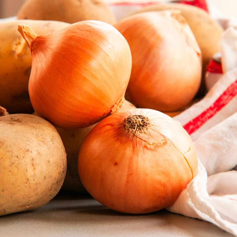 Pile of onions and potatoes